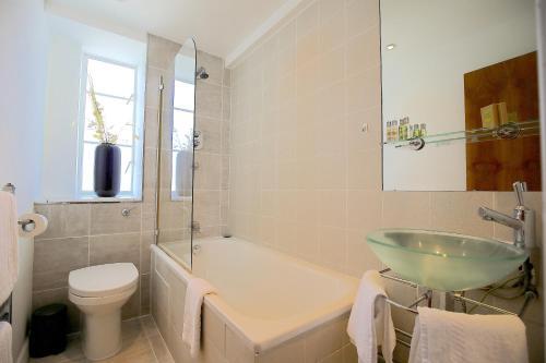 Foto del baño de Roland House Apartments