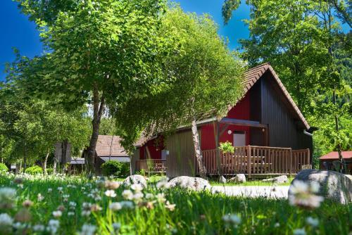 Foto de una habitación de Auberge et Chalets de la Wormsa