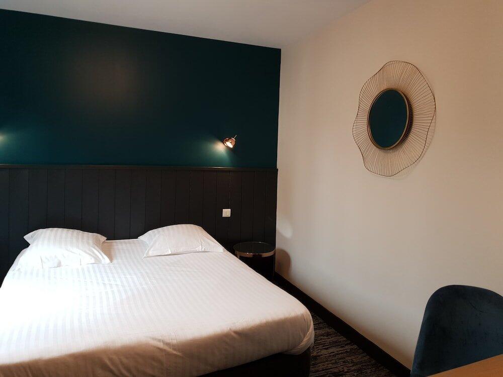 Foto de una habitación de The Originals Boutique, Hôtel La Colonne de Bronze, Saint-Valéry-sur-Somme (Inter-Hotel)