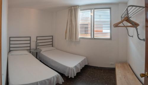 Foto de una habitación de Apartaments Voralmar - Mas d&amp;#039;en Gran