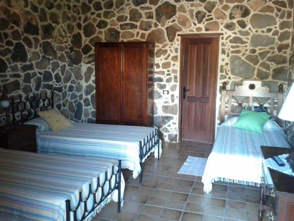 Foto de una habitación de Hotel Rural Restaurante Mahoh