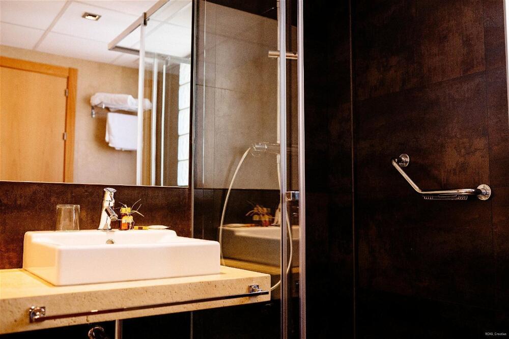 Foto del baño de Hotel Can Batiste