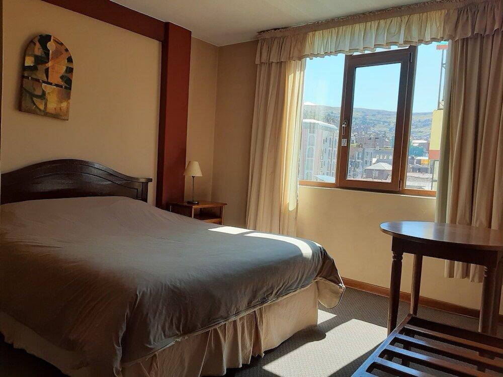 Foto de una habitación de Qelqatani Hotel