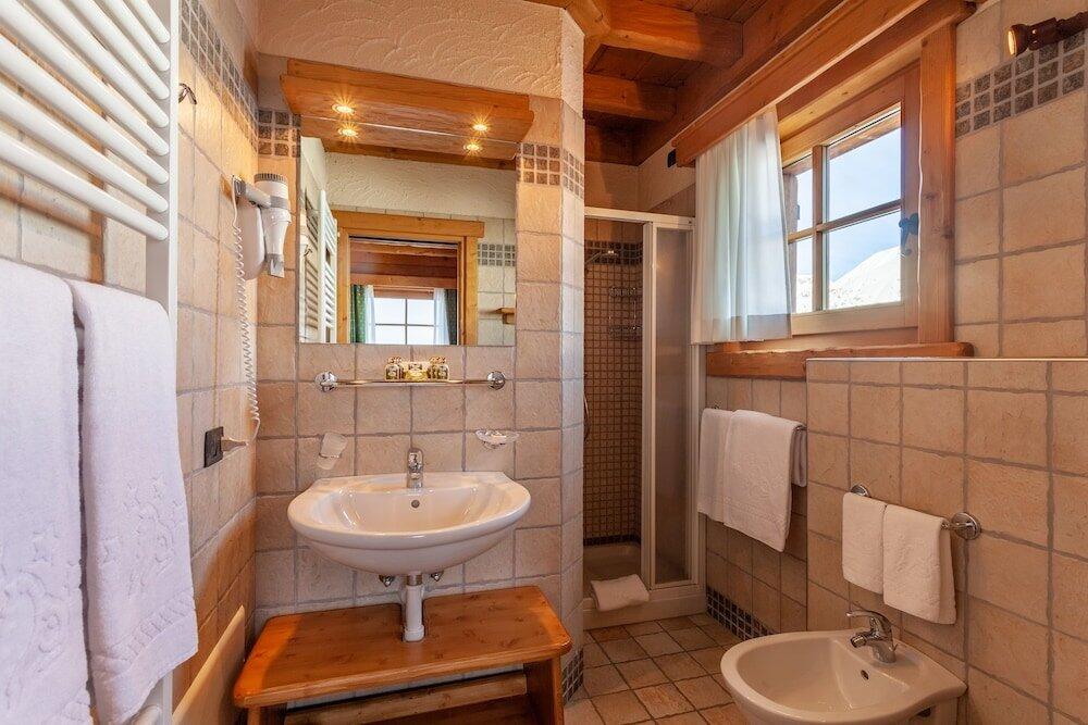 Foto del baño de Park Chalet Village