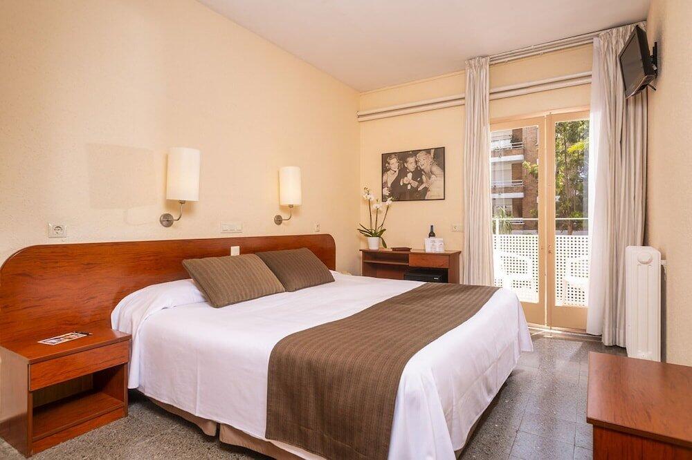 Foto de una habitación de Hotel Guitart Rosa - Adults Only