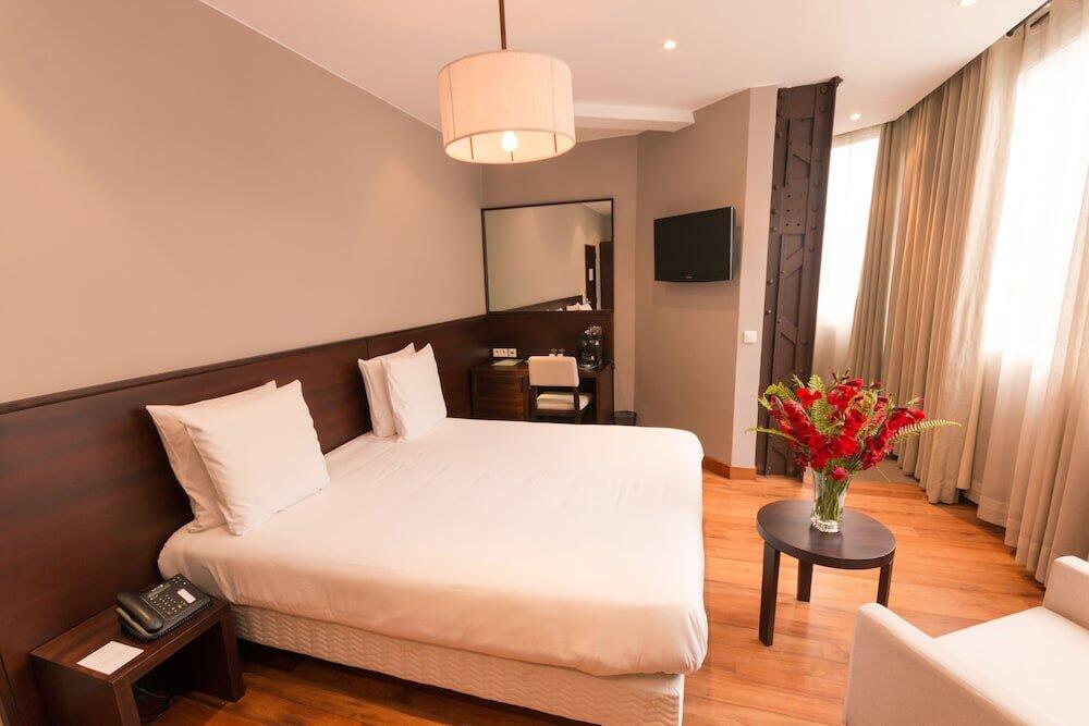 Foto de una habitación de Le Louvre Hotel &amp;amp; Spa
