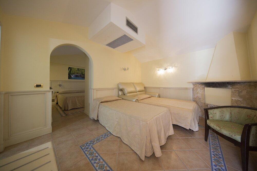Foto de una habitación de Mancini Park Hotel