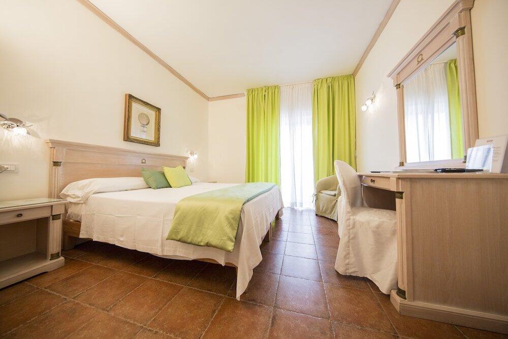 Foto de una habitación de Mancini Park Hotel