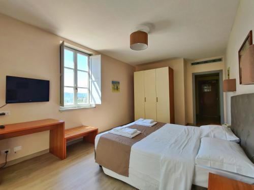 Foto de una habitación de Hotel Toscana Verde