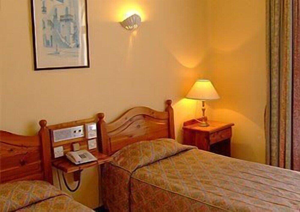Foto de una habitación de Cornucopia Hotel