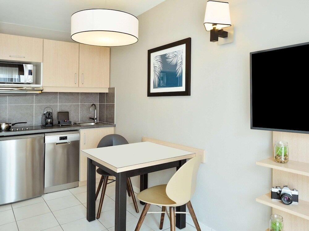 Foto de una habitación de Aparthotel Adagio Monaco Monte Cristo