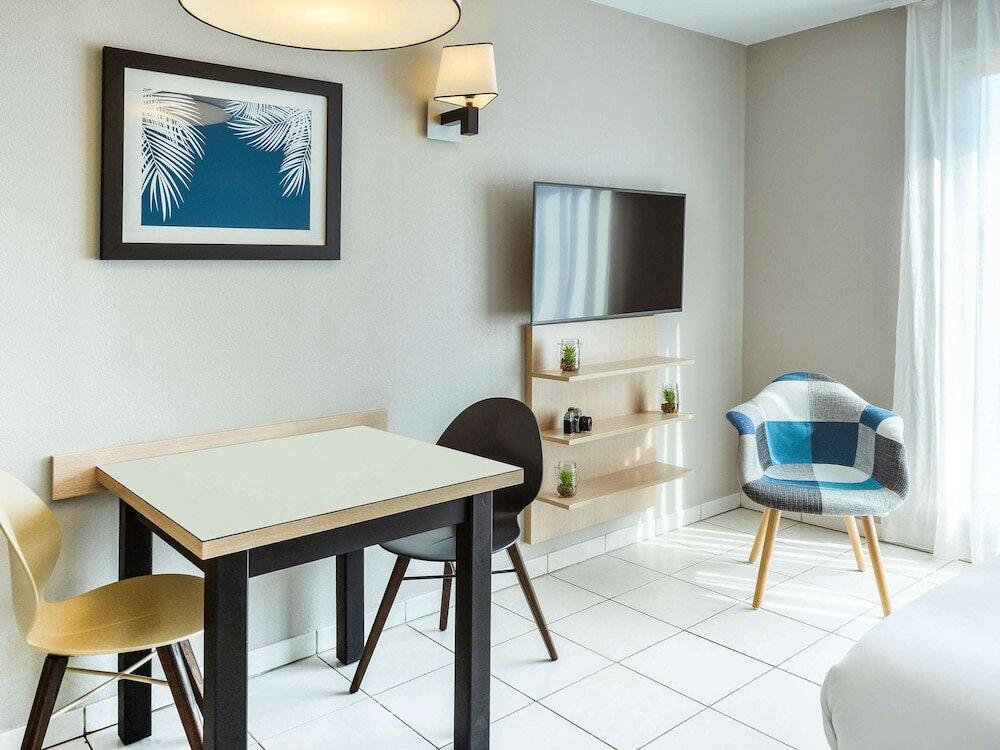 Foto de una habitación de Aparthotel Adagio Monaco Monte Cristo