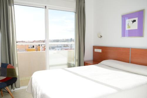 Foto de una habitación de Hotel y Apartamentos Mirablau