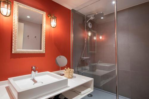 Foto del baño de Hotel Novotel Orléans Sud La Source