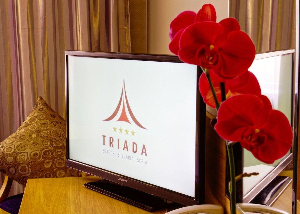 Foto de una habitación de Triada Hotel