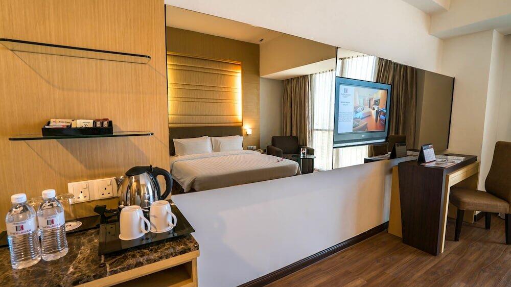 Foto de una habitación de Hotel The Klagan Regency