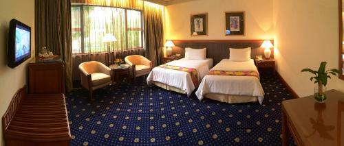 Foto de una habitación de The Jesselton Hotel
