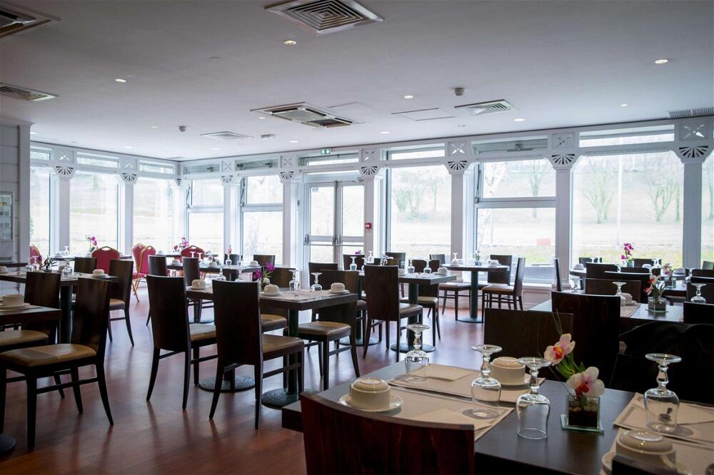 Foto de restauración de Hotel du Golf Rosny
