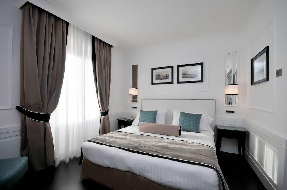 Foto de una habitación de Grand Hotel Oriente