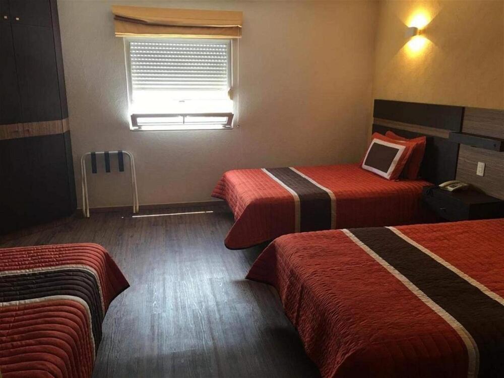 Foto de una habitación de Ibeurohotel Guadalajara Expo