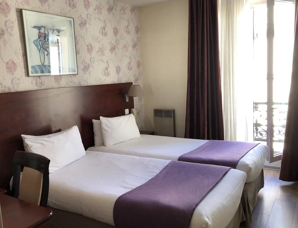 Foto de una habitación de Hôtel Alane