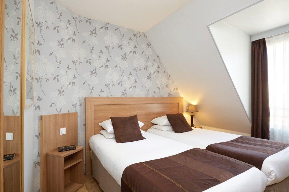 Foto de una habitación de Hôtel Alane