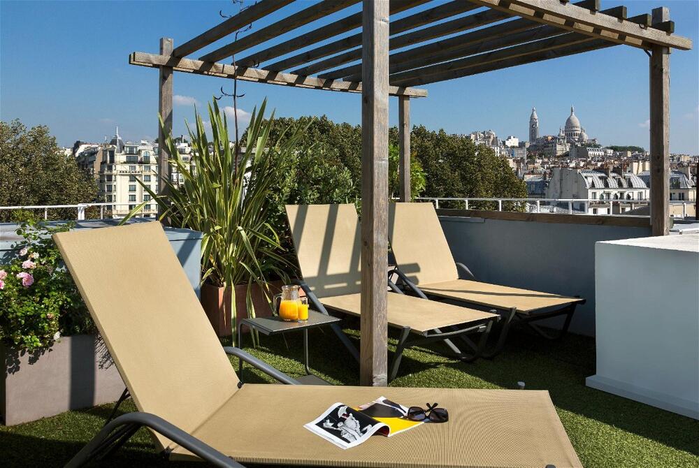 Foto de restauración de Aparthotel Citadines Montmartre Paris