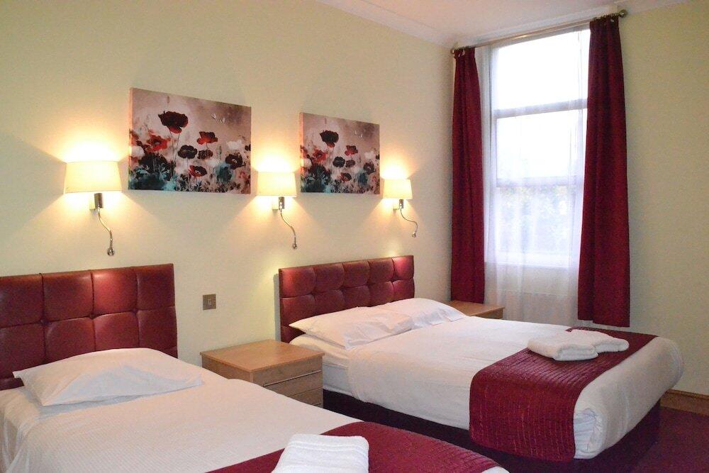Foto de una habitación de Hotel 65
