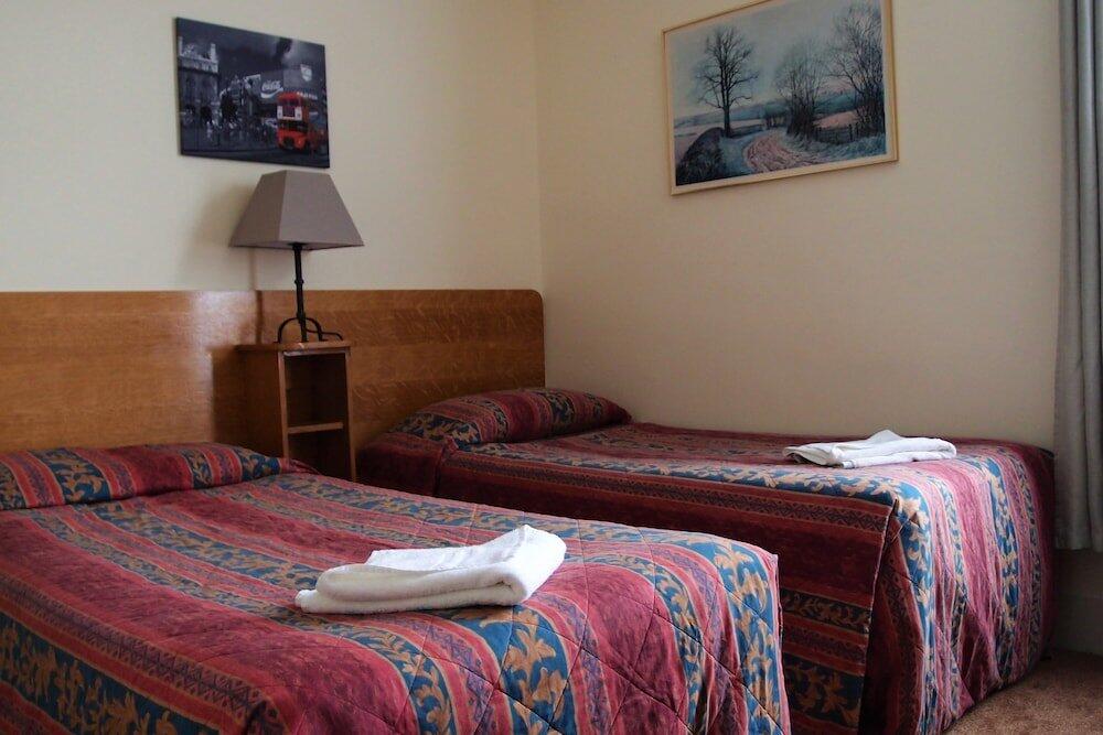 Foto de una habitación de Hotel 65