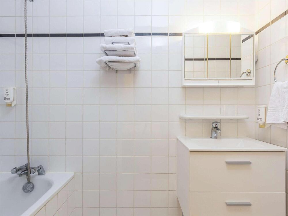 Foto del baño de Aparthotel Adagio Access La Défense - Léonard De Vinci