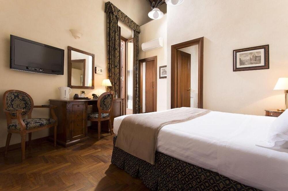 Foto de una habitación de Hotel Teatro Pace