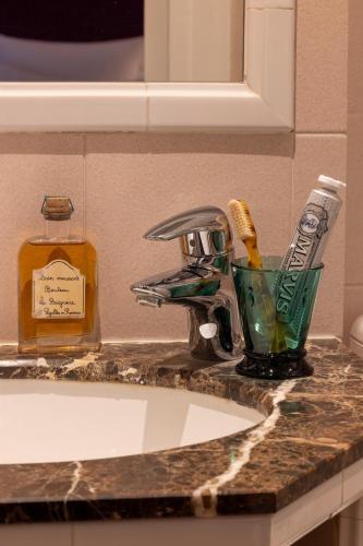 Foto del baño de Hôtel Le Saint-Grégoire