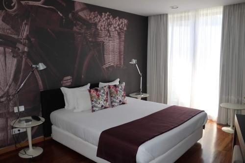 Foto de una habitación de LBV House Hotel