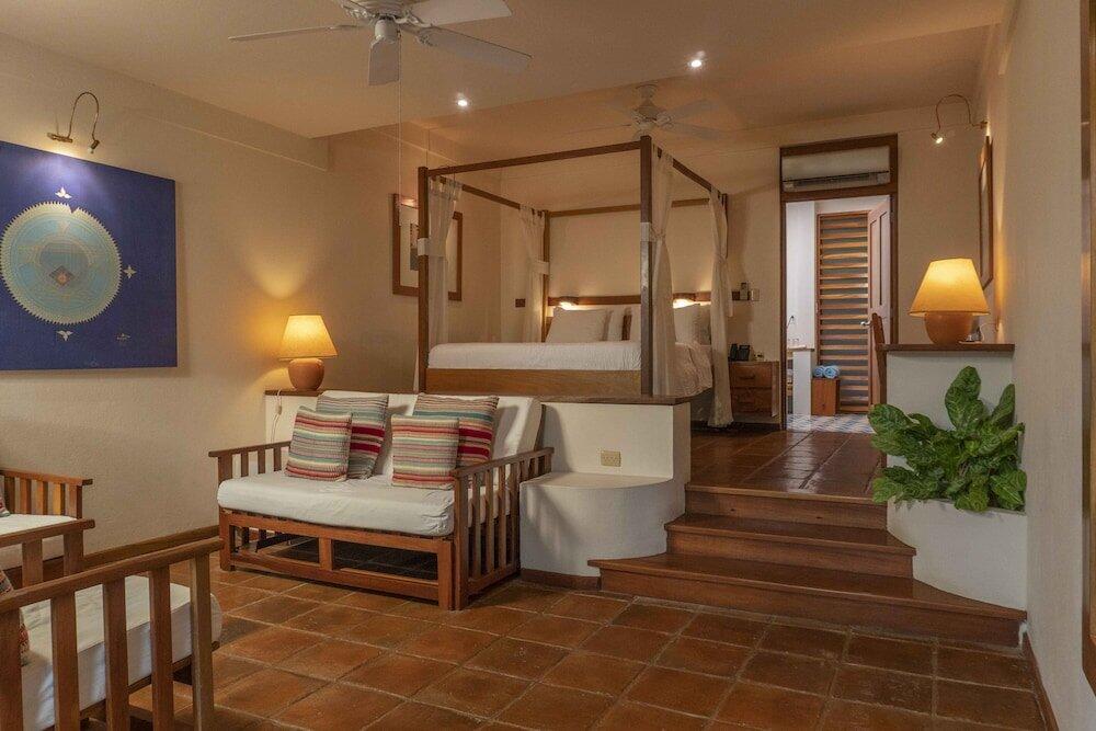 Foto de una habitación de Capitán Suizo Beachfront Boutique Hotel