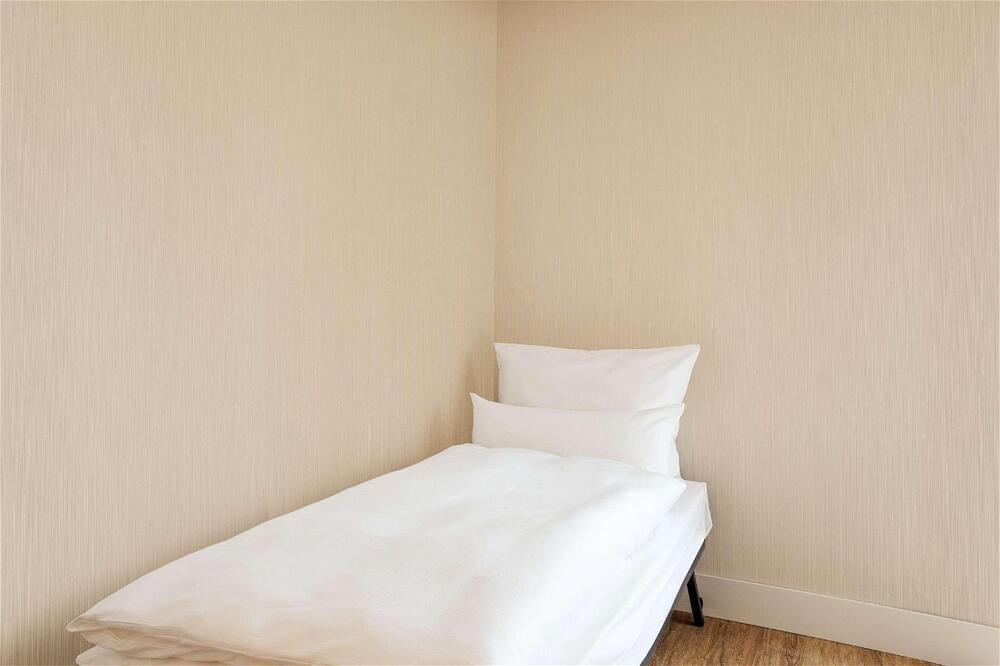 Foto de una habitación de Hotel NH Gent Belfort