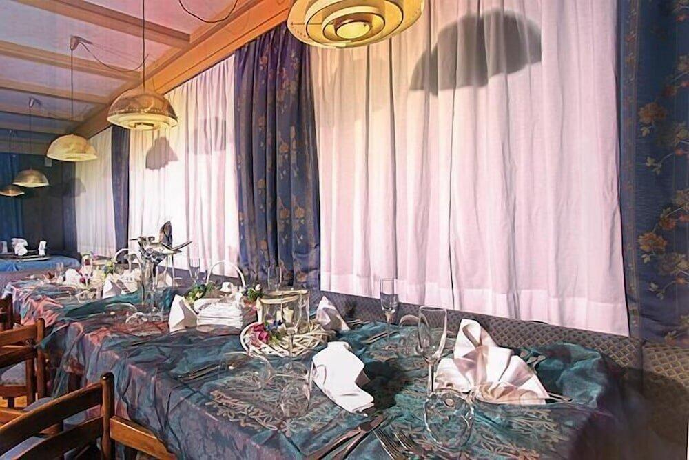 Foto de restauración de Hotel il Caminetto Sport