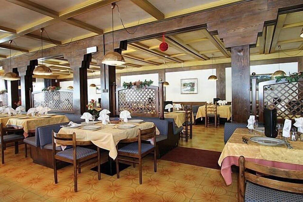 Foto de restauración de Hotel il Caminetto Sport