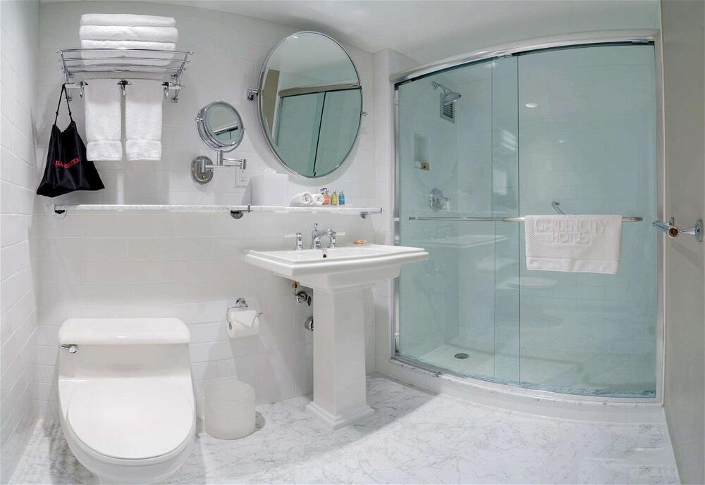 Foto del baño de Garden City Hotel