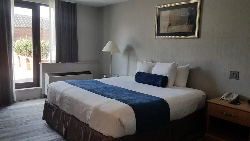 Foto de una habitación de Marco LaGuardia Hotel &amp;amp; Suites