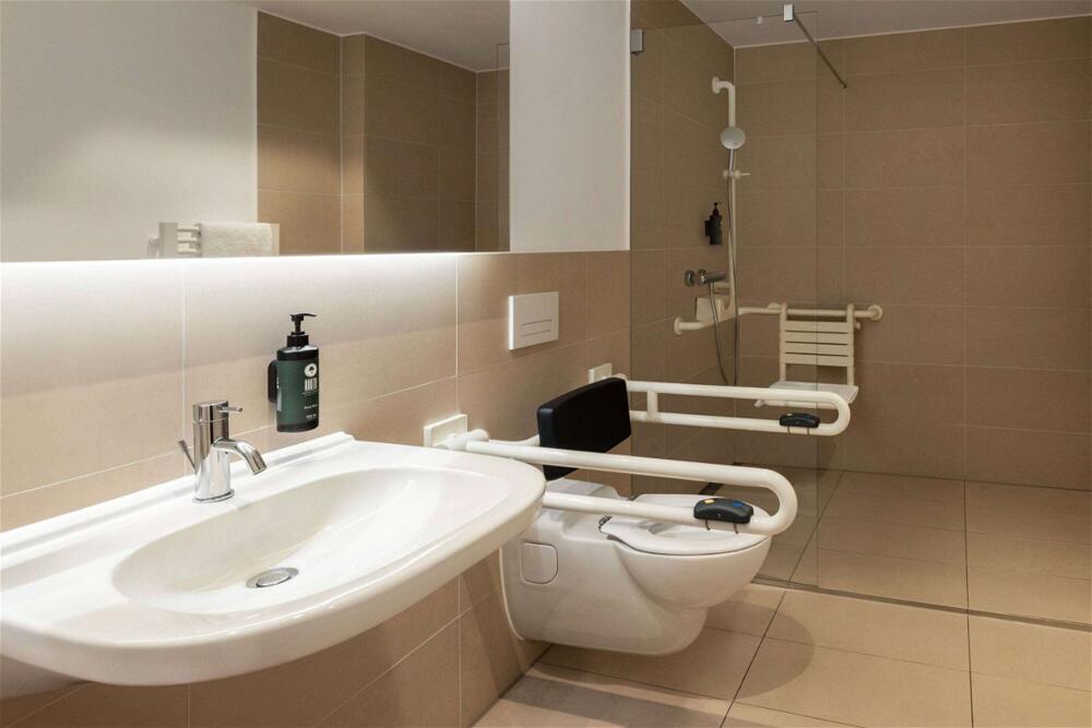 Foto del baño de Hotel Amedia Plaza Dresden, Trademark Collection by Wyndham