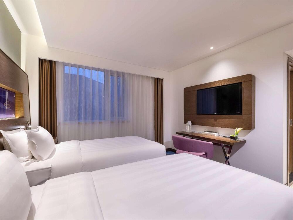 Foto de una habitación de Hotel Novotel Beijing Peace