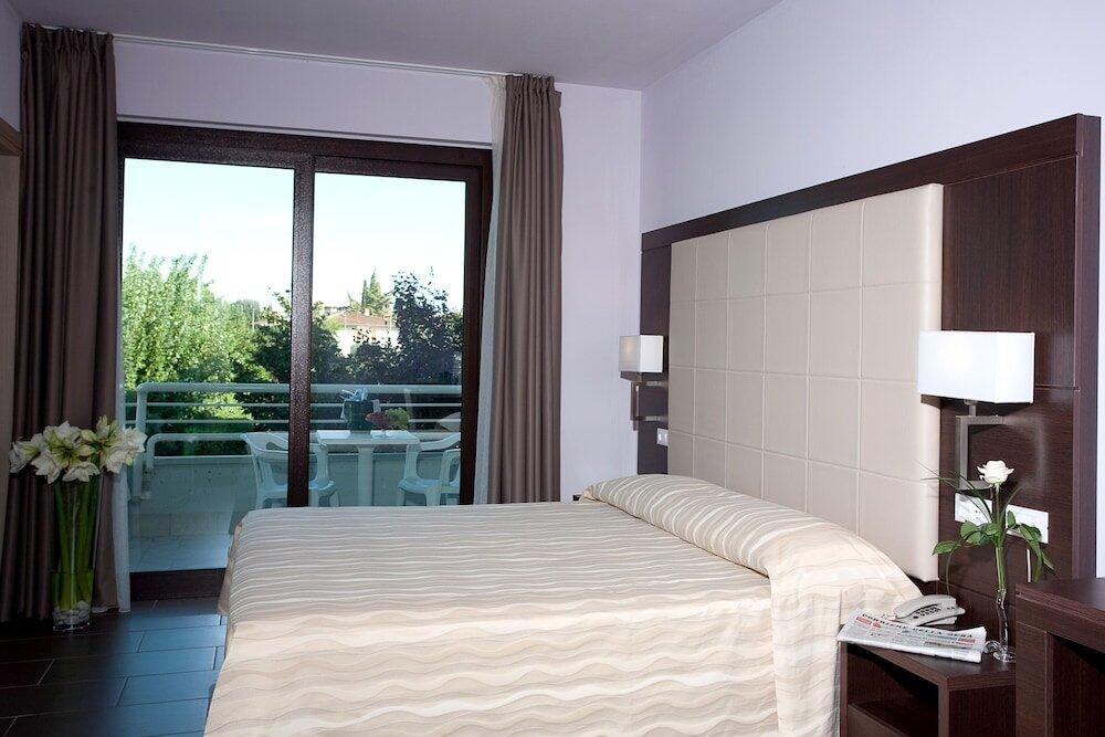Foto de una habitación de Hotel Porto Azzurro