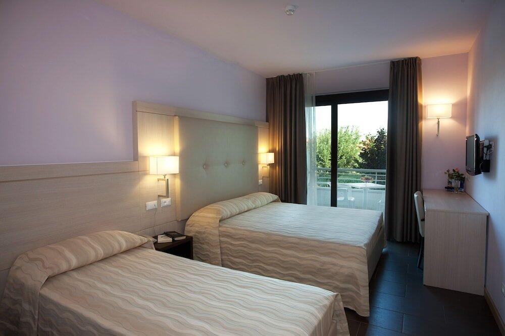 Foto de una habitación de Hotel Porto Azzurro