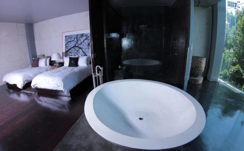 Foto del baño de Demetria Hotel