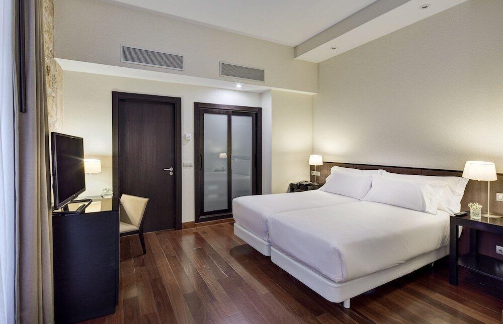 Foto de una habitación de Hotel Sercotel Puerta de la Catedral