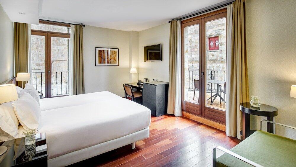 Foto de una habitación de Hotel Sercotel Puerta de la Catedral