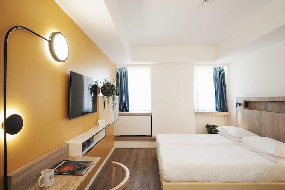 Foto de una habitación de Aparthotel Colombo Roma