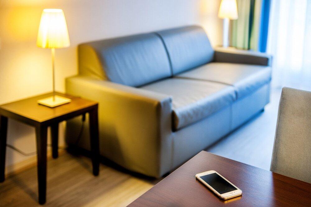 Foto de una habitación de Appart&amp;#039;hôtel Saint Jean
