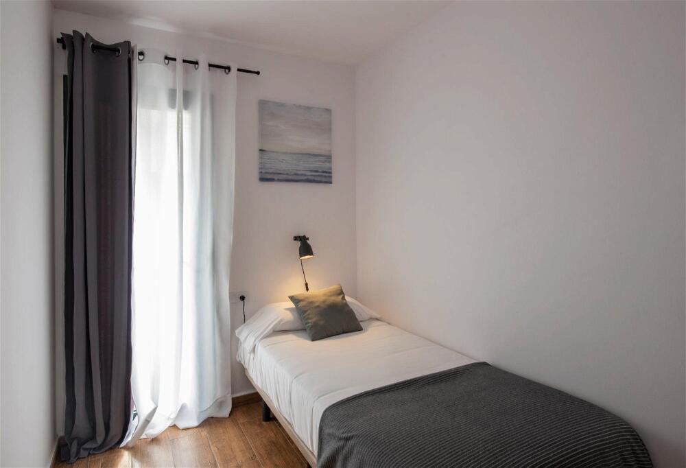Foto de una habitación de Apartamentos Los Rosales