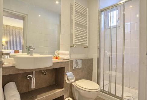 Foto del baño de Hôtel Mondial